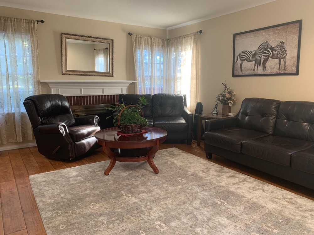 Full view of fireplace living room and conversation area