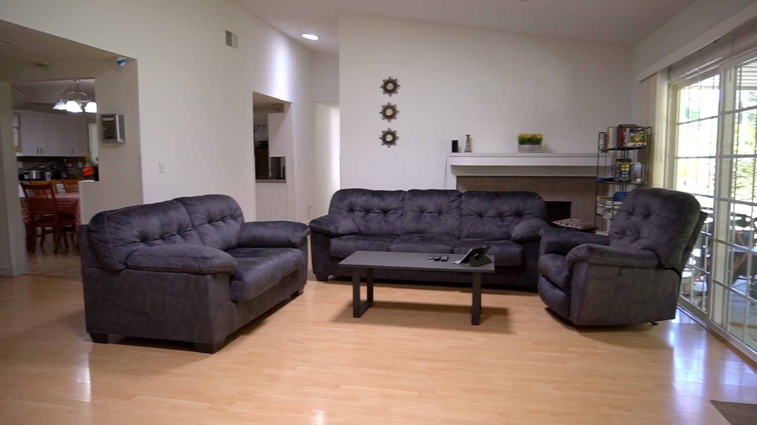 Spacious living room lounge with fireplace and comfortable sofas