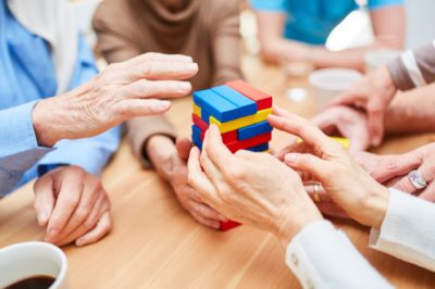 Residents enjoying companionship and cognitive activities